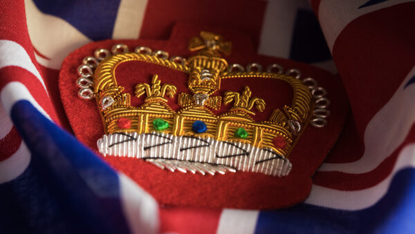 The crown broche in the middle of the Union Jack flag
