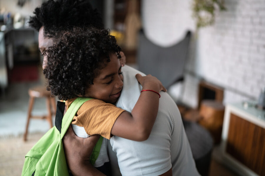 Father and child hugging