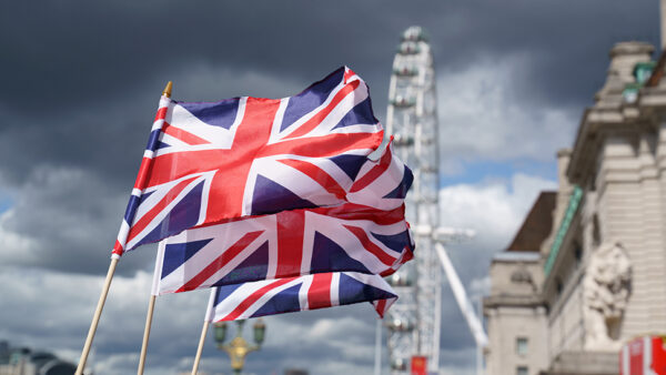 Picture of Union Flags waving near the London Eye