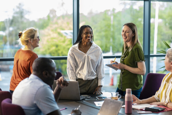 A group of employees having a discussion