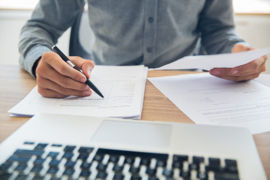 A man doing employment contracts