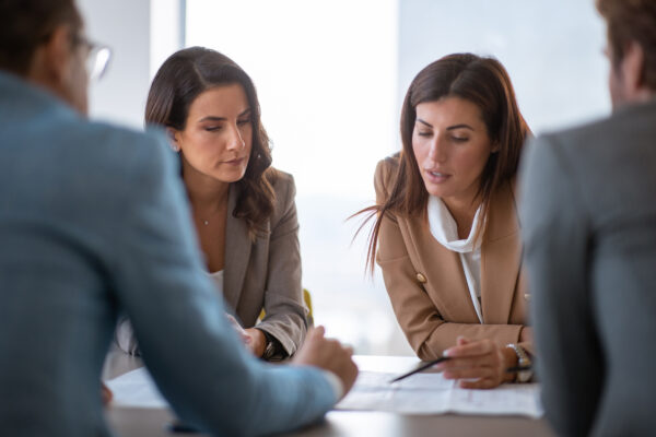 Four people conducting an appraisal