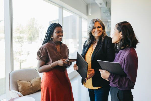 Three teachers having a meeting