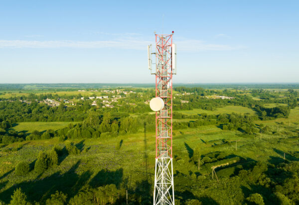 Telecom tower in a field