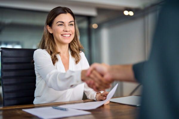 A lady shaking hands