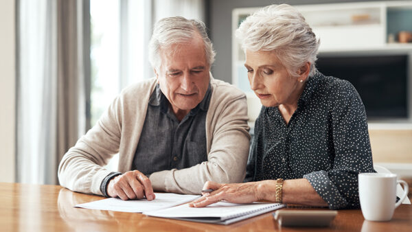 Two people reviewing their inheritance plan.