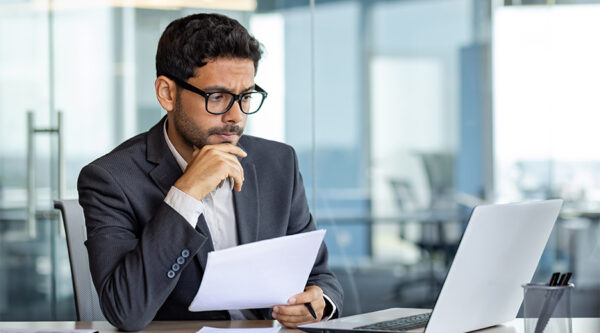 A business partner reading a letter