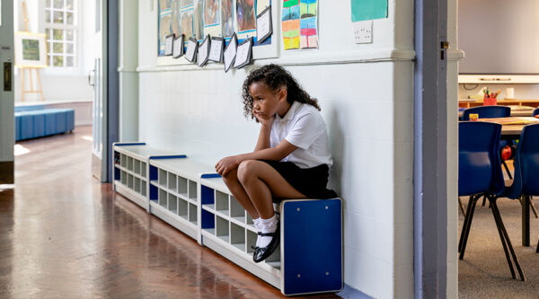 A pupil outside a classroom