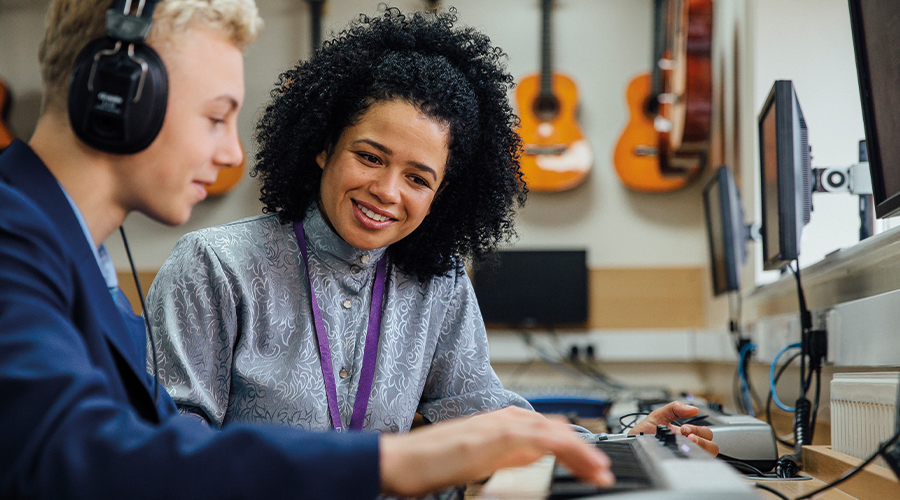 Image of a music teacher and student